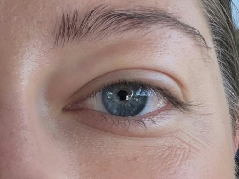 Before: natural lashes, blue eyes
