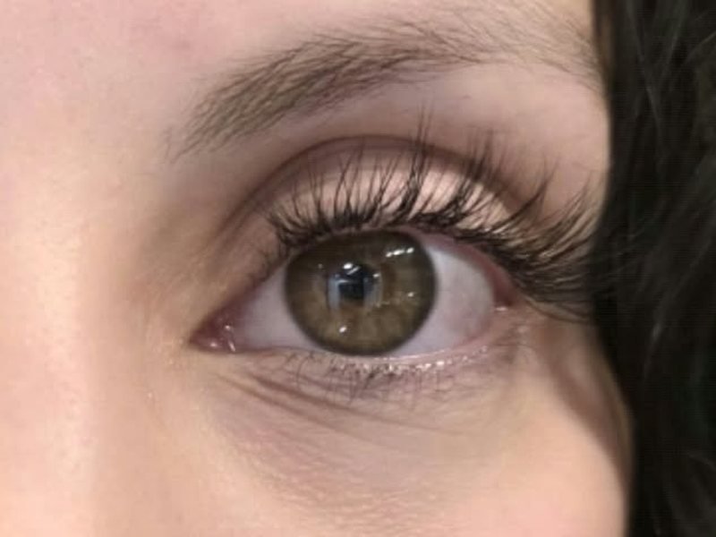 After: Designed lash extensions by CHIQUE AESTHETIC, brown eyes